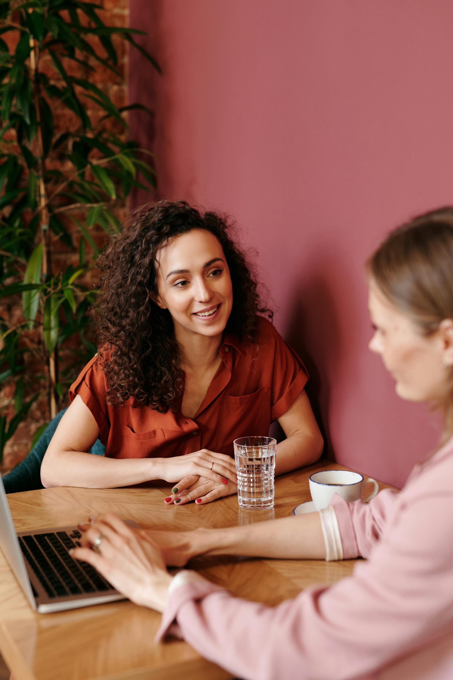 Childcare center owners having a supportive conversation together